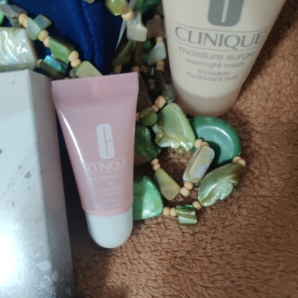 Clinique Blue and White Cosmetic Bag with Beauty Products - Picture 7 of 11